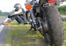 Motorcyclist stranded on roadside.