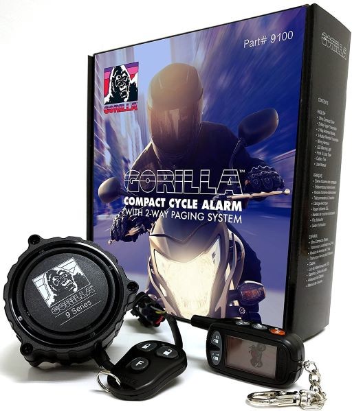 Gorilla motorcycle alarm components set in front of packaging  
