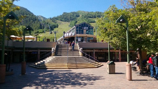 Shops and steps in Aspen on the edge of town leading to chair lifts for skiers.   