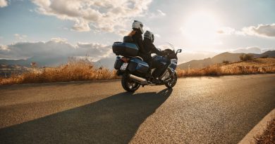 Two riders on a BMW motorcycle