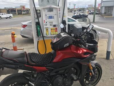 Motorcycle at gas pumps