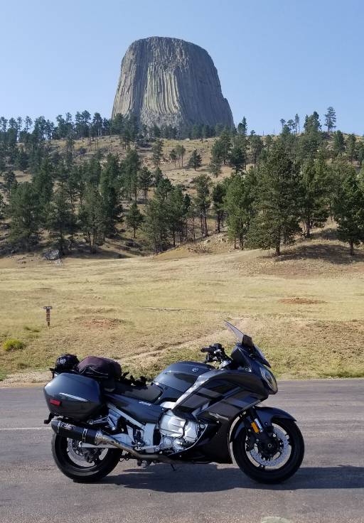 Sport touring motorcycle below Devils Tower