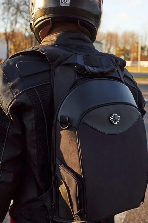 Rider wearing Axe Backpack