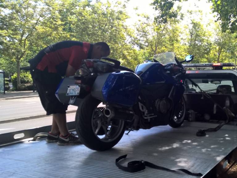 Honda VFR on flatbed tow truck