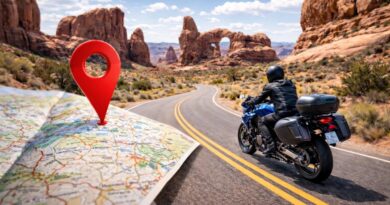 A sport-touring rider travels a winding road through Arches National Park, with a map and location pin highlighting the route.