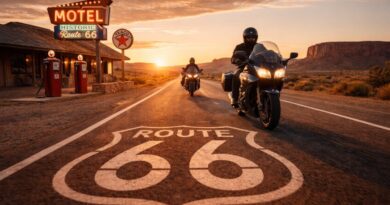 Riders on Route 66 passing an imagined historic roadside gas station.