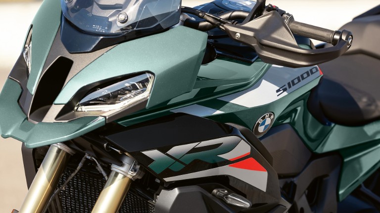 Close-up fairing view of updated 2026 S 1000 XR in Sage Green metallic paint.