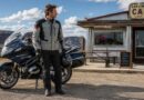 Sport touring rider parked outside a roadside diner