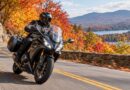Motorcycle rider in autumn sun